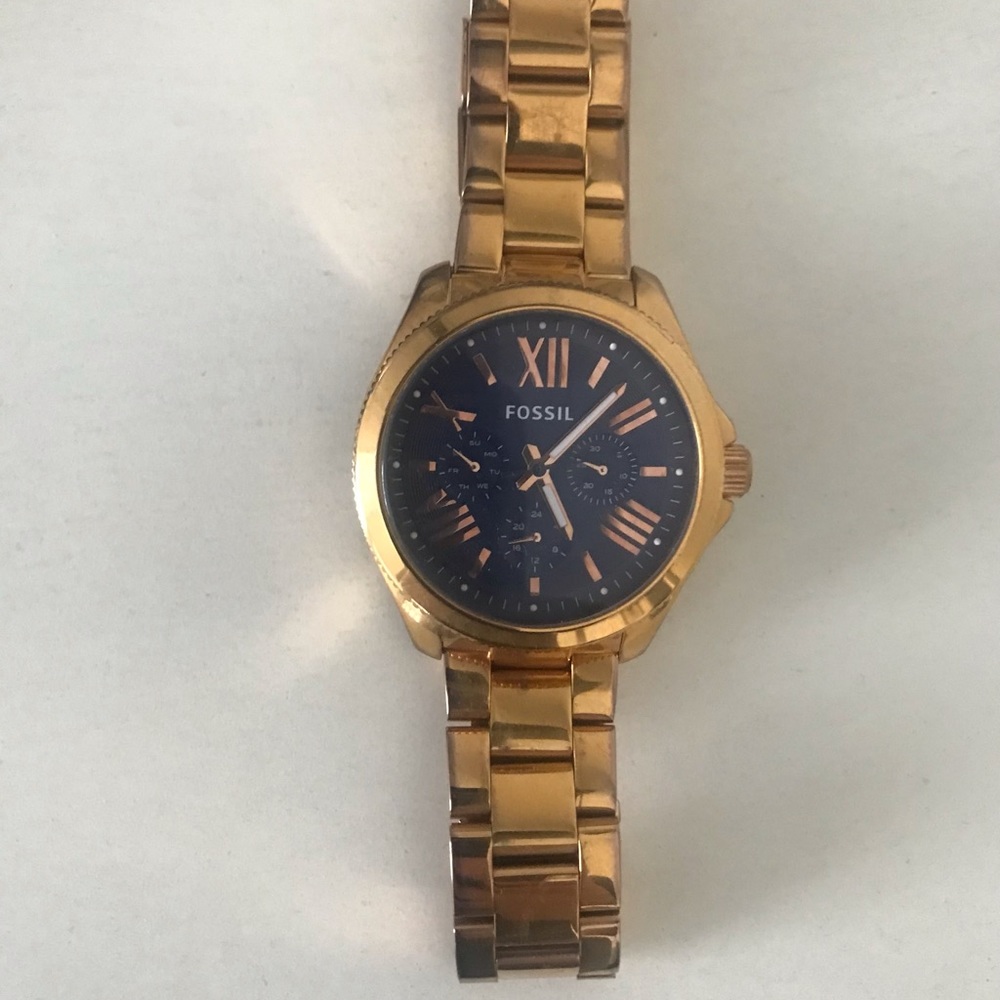 Blue and gold Fossil watch